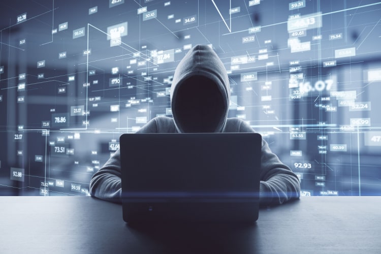 imagem mostra um hacker fazendo ataque ransomware